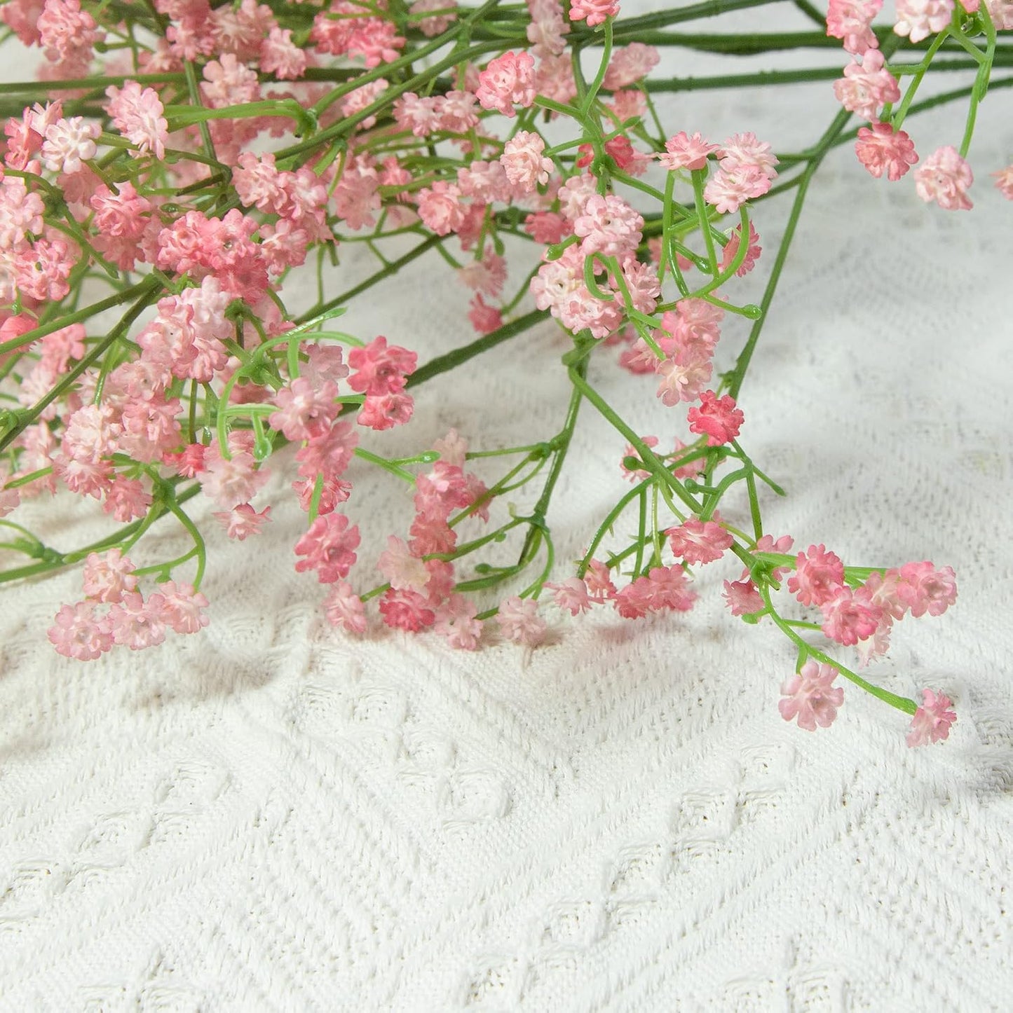 Light pink gypsophila stem styled in a vase