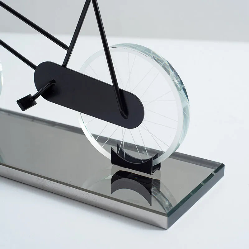 Metal crystal bicycle sculpture styled on coffee table