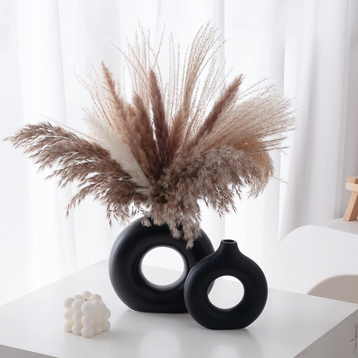 Black donut vase set, close-up detail