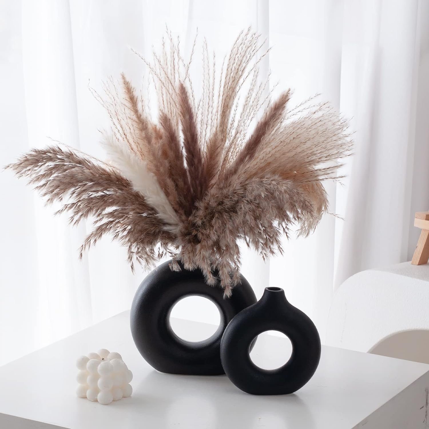 Black donut vase set, close-up detail