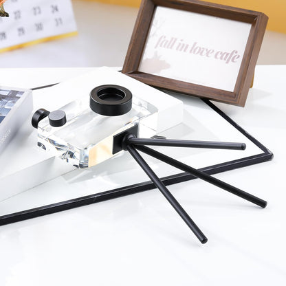 Crystal camera sculpture styled on display shelf