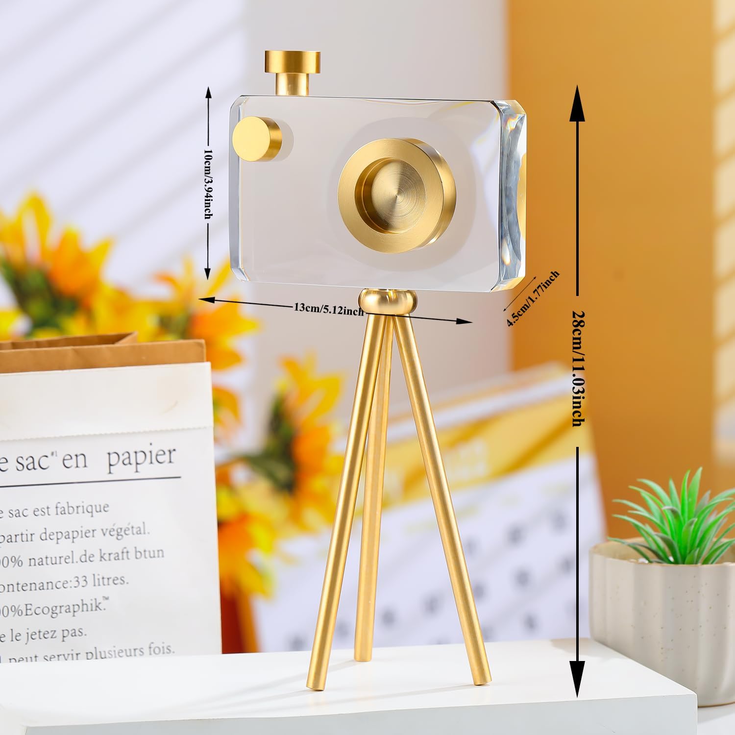 Golden crystal camera sculpture, close-up detail