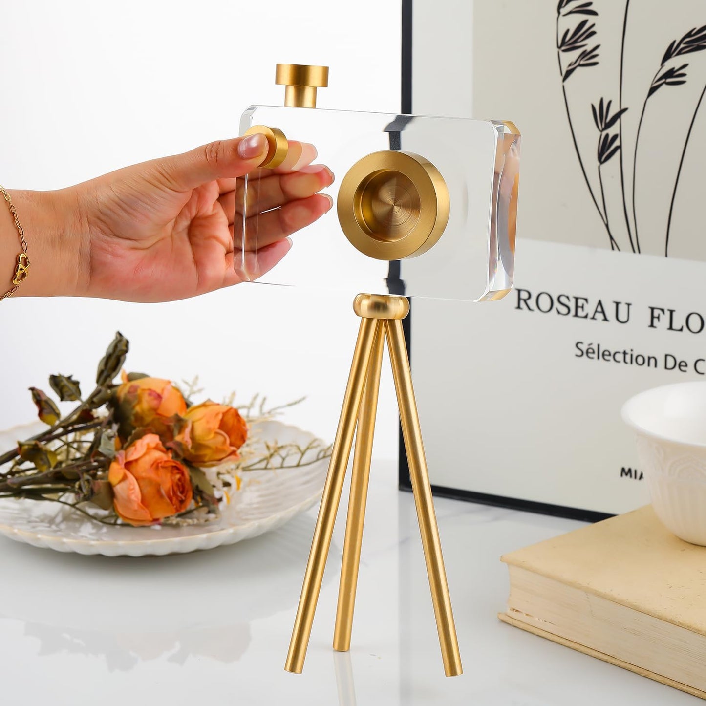 Golden crystal camera sculpture, angled view