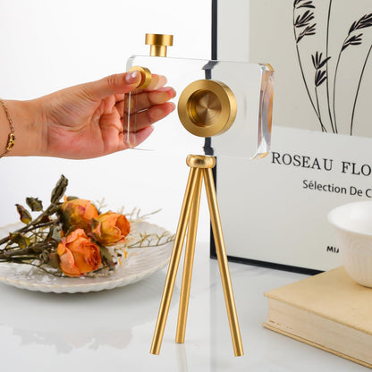 Golden crystal camera sculpture, angled view