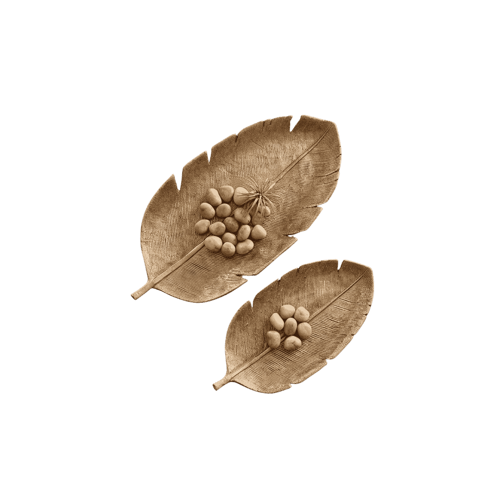 Set of two gold leaf-shaped decorative trays in small and large sizes