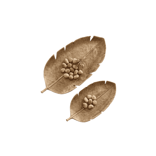 Set of two gold leaf-shaped decorative trays in small and large sizes