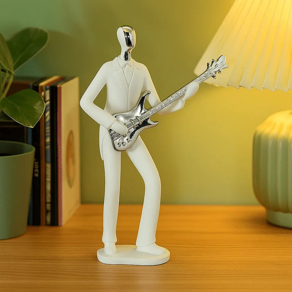 Guitar player figurine, side view