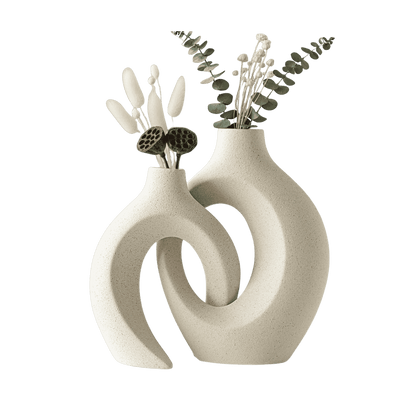 Pair of hollow ceramic vases for modern interiors