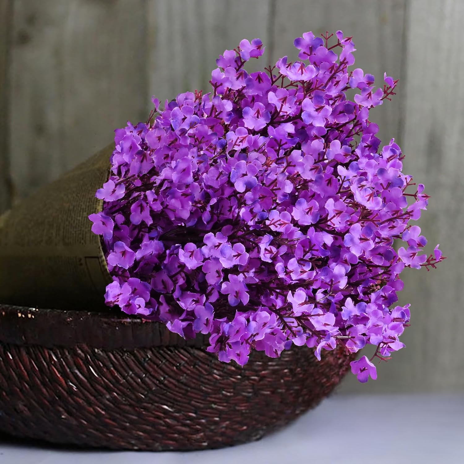 Purple baby breath stem styled in a vase