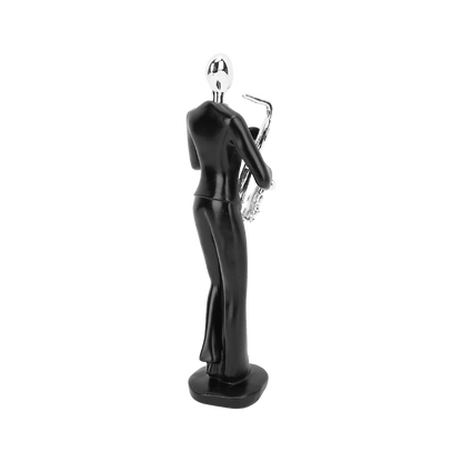 Saxophone player figurine, side view