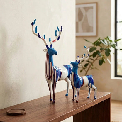 Splashing color deer sculpture, side view