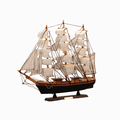 Wooden sailboat model for coastal-themed interiors